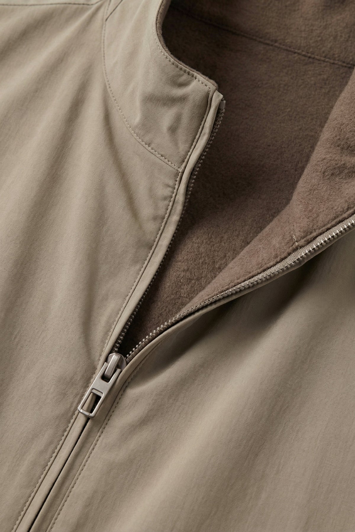 Omkeerbaar bodywarmer taupe