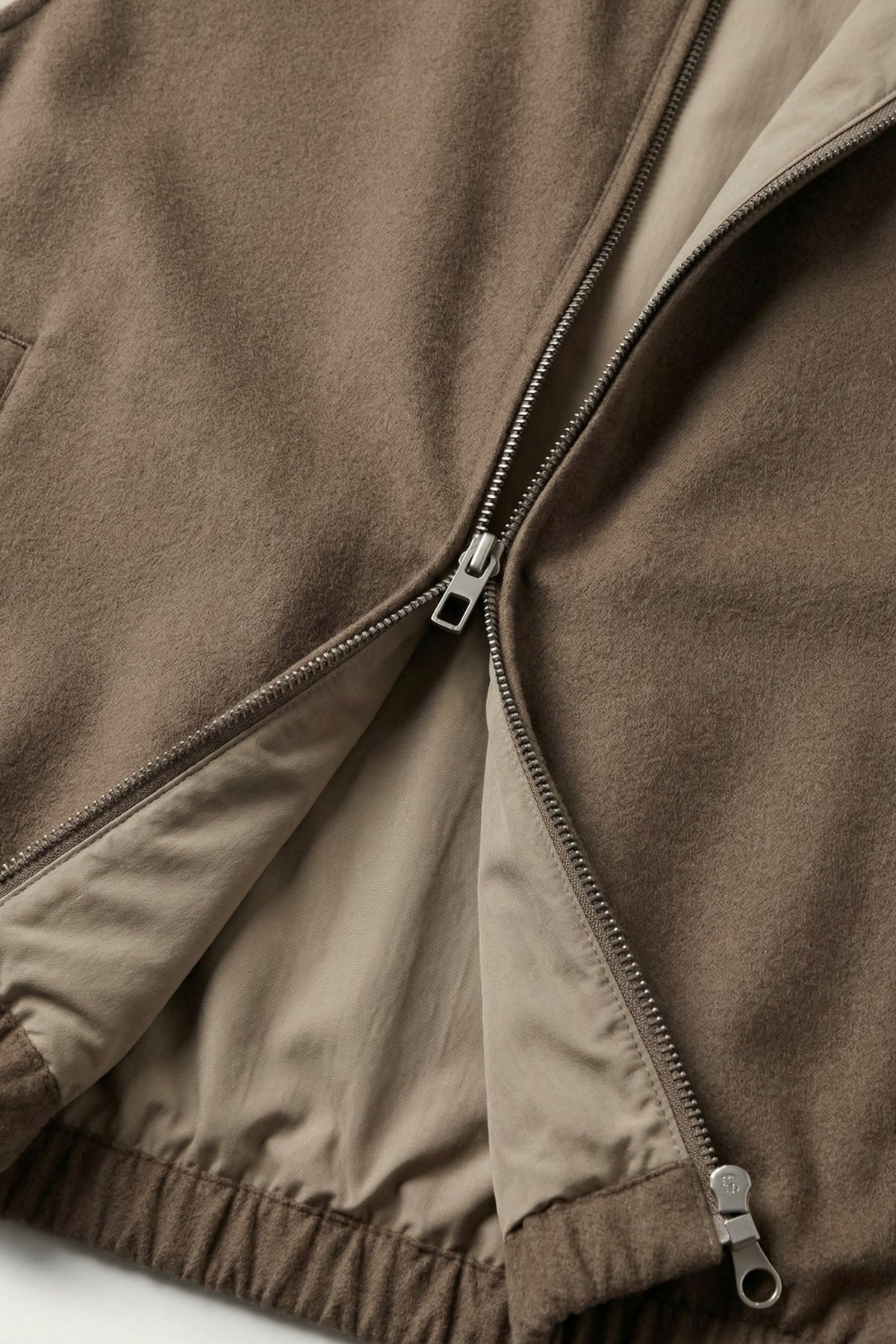 Omkeerbaar bodywarmer taupe